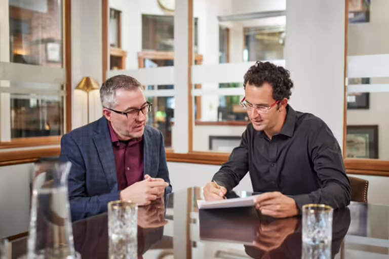 Blake Harris consulting with a client