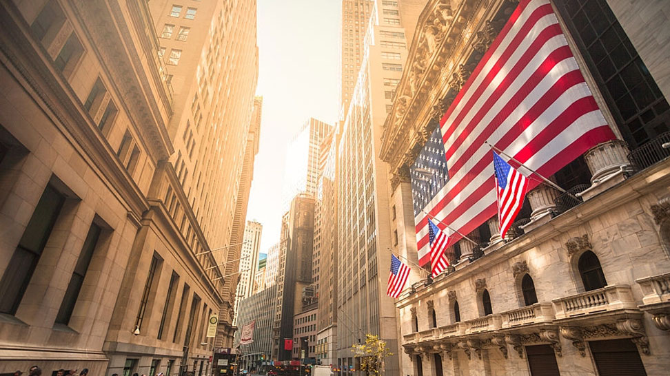 new york stock exchange with usa flag