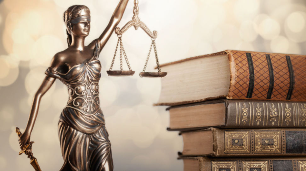 lady of justice with law books