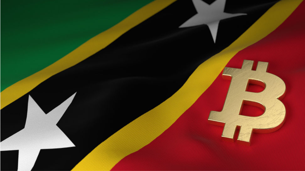 bitcoin currency symbol on flag of saint kitts and nevis