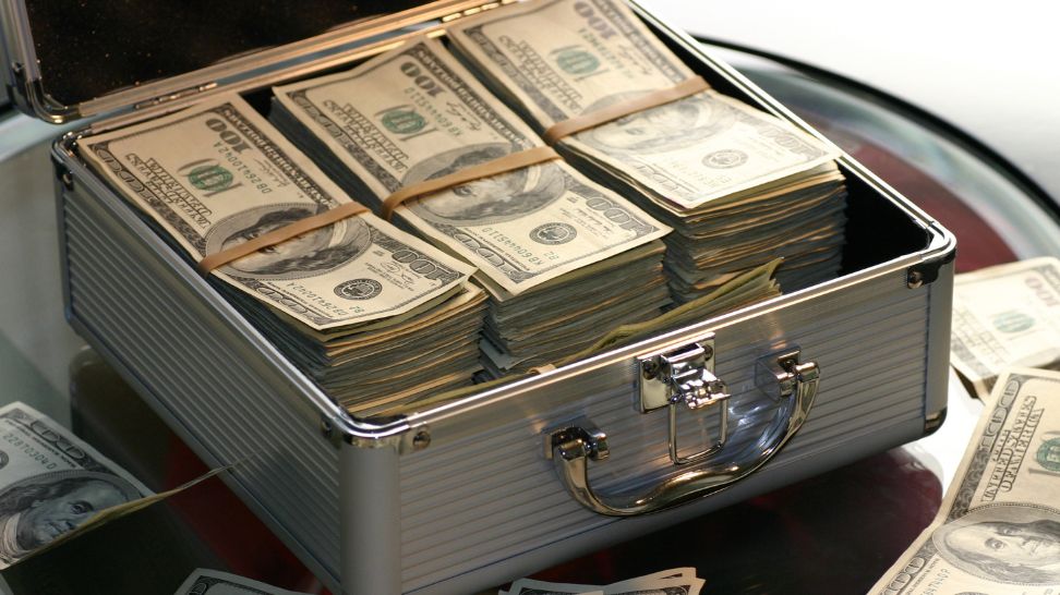 briefcase full of one hundred dollar bills