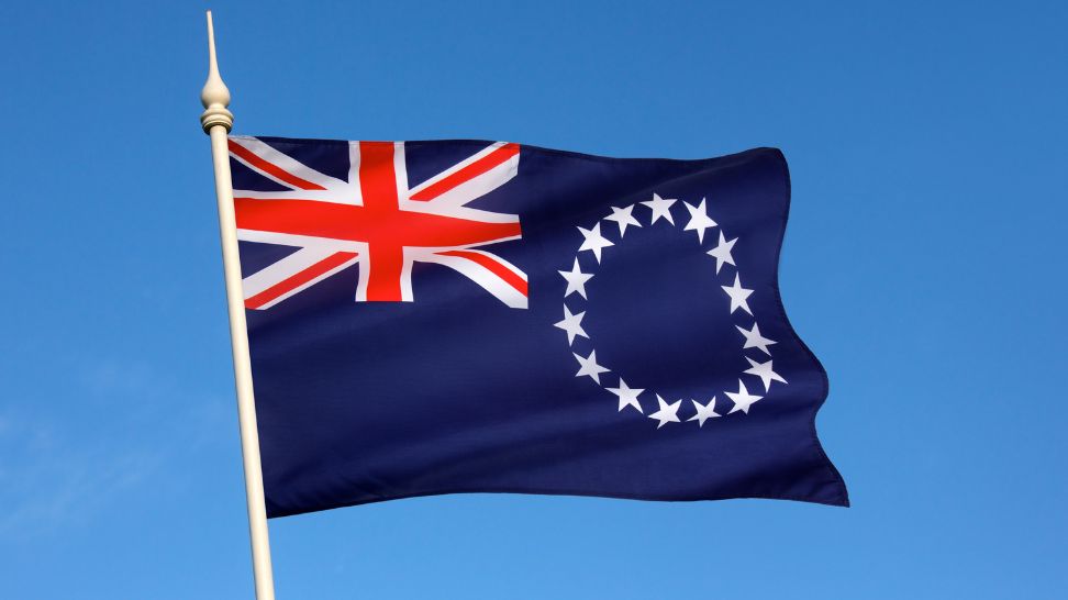 cook islands flag waiving on sky background