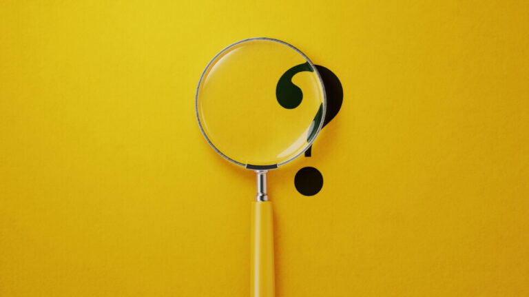 magnifying glass and question mark