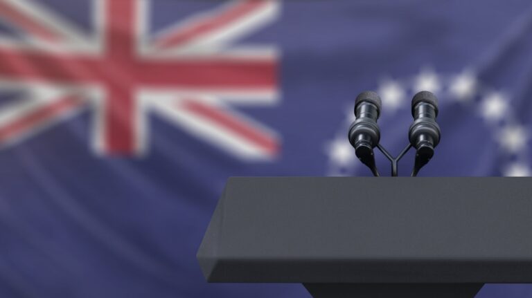 cook island flag with microphone at the front