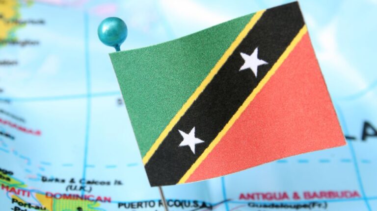 Nevis flag pinned on map