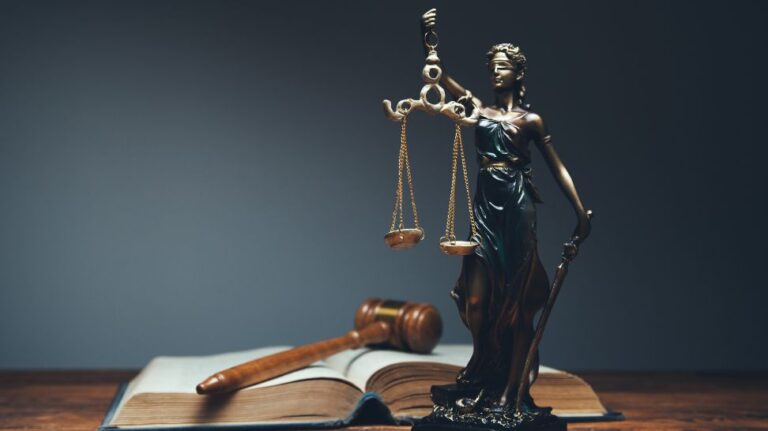 lady justice law book and gavel