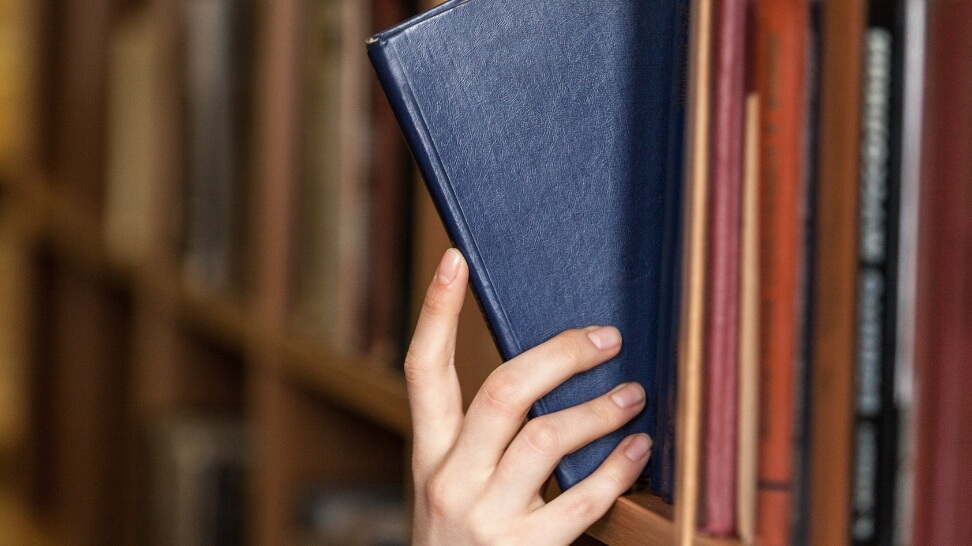 getting a book from book shelf