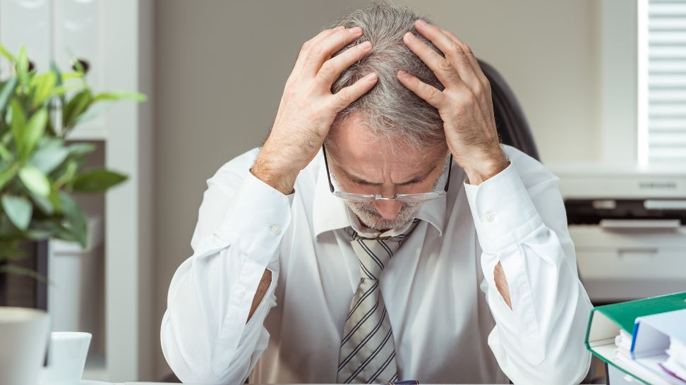 man stressed with filing bankruptcy