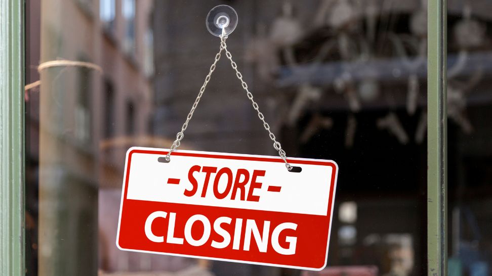 store closing sign in front of the door